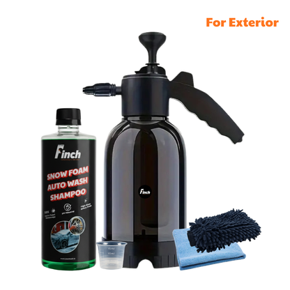 Car cleaning kit with snow foam auto wash shampoo, black pressure washer, microfiber cloths, and mitt on a white background.